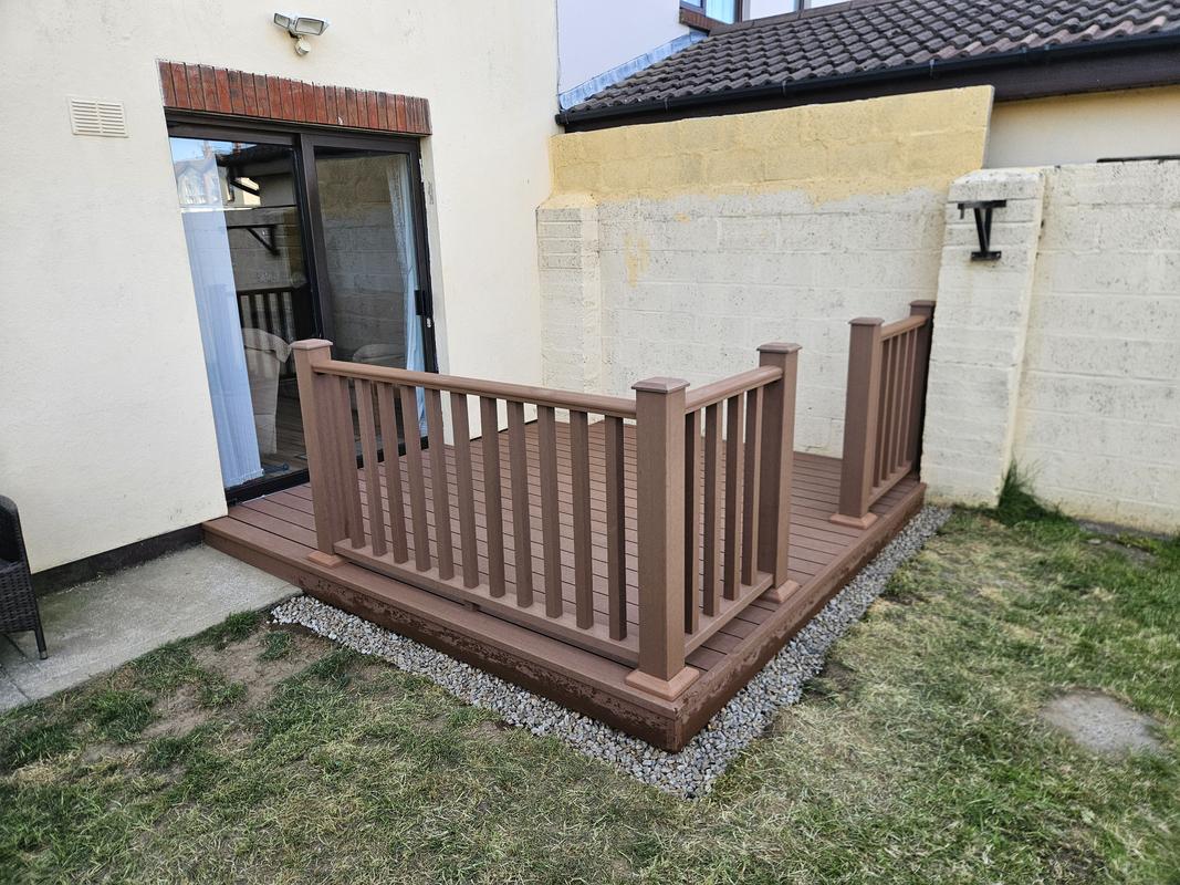 Composite deck with matching balustrade off the back of a Dundalk home