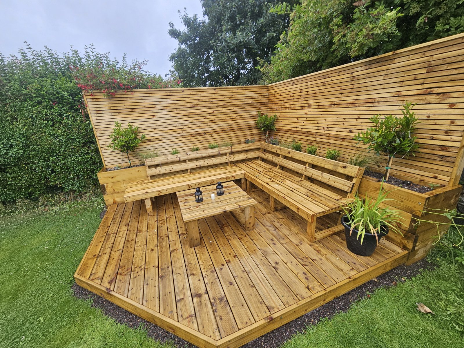 Raised composite deck off the back of a house
