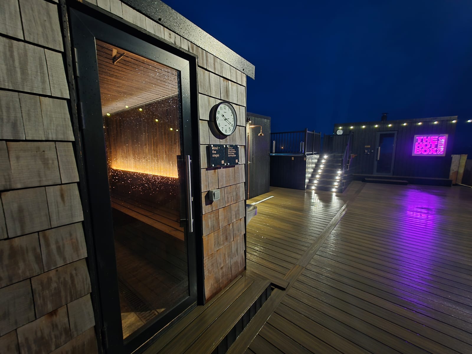 Cedar sauna door on the finished marina wellness deck